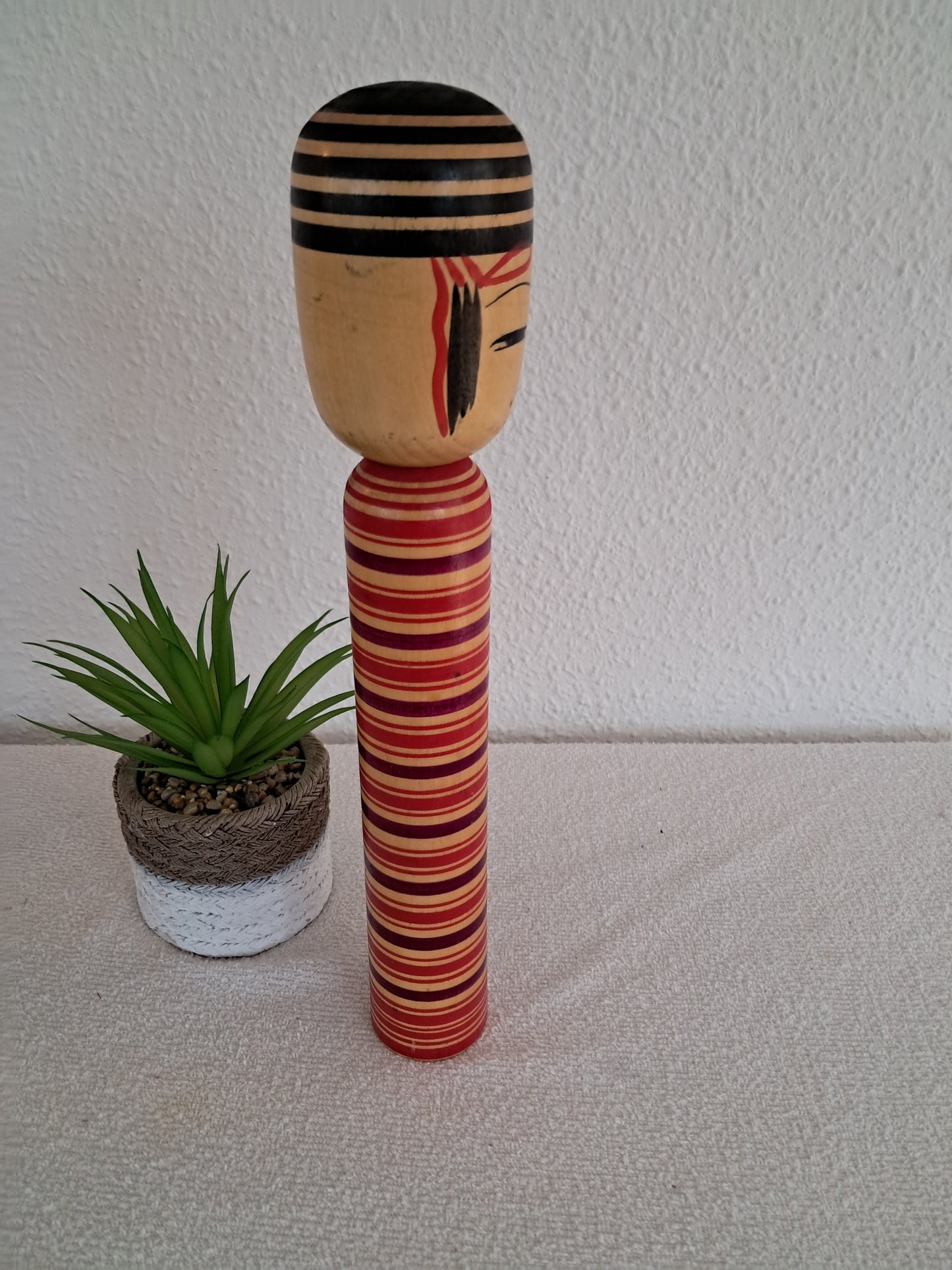 Traditional kokeshi by Jiryo Kobo atelier.